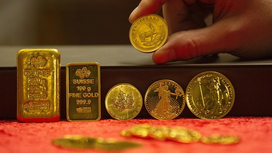 Giá vàng hôm nay 21-7, chạm mốc lịch sử 1.450 USD/ounce