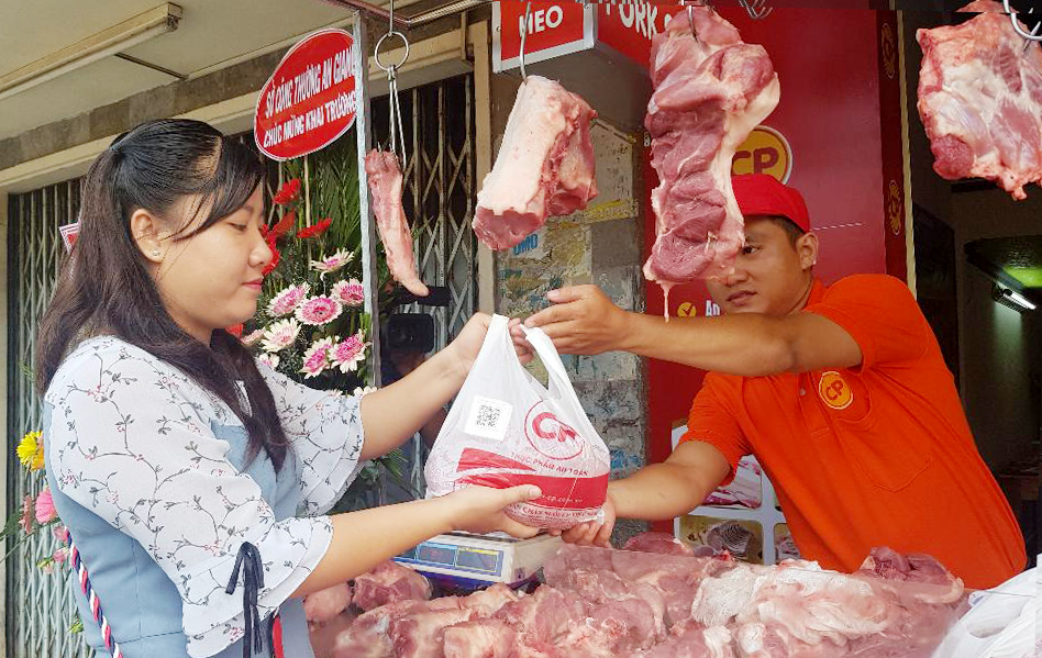 Khai trương Cửa hàng thịt heo an toàn Trung Tâm, tại chợ Bình Khánh