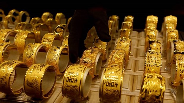 Giá vàng tăng gần 1% trong tuần qua do nhu cầu ''trú ẩn an toàn''
