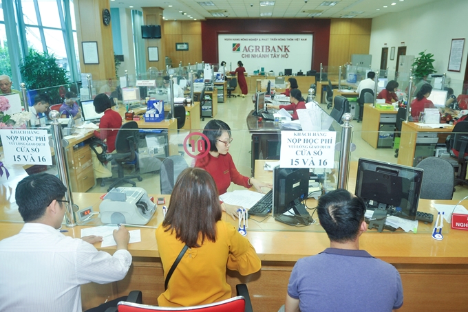 Ngành ngân hàng hỗ trợ tháo gỡ khó khăn do tác động của dịch COVID-19