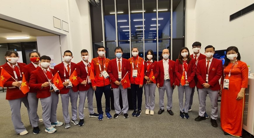 Hình ảnh Đoàn thể thao Việt Nam diễu hành ở lễ khai mạc Olympic Tokyo