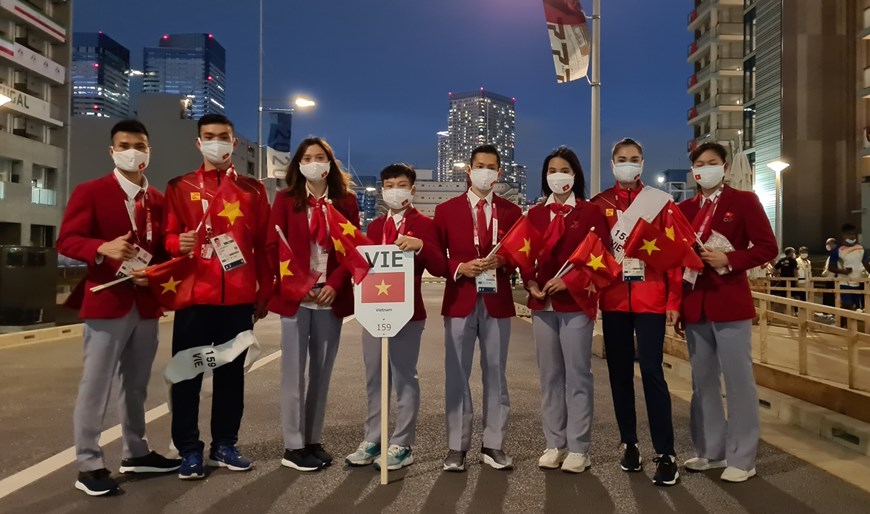 Hình ảnh Đoàn thể thao Việt Nam diễu hành ở lễ khai mạc Olympic Tokyo