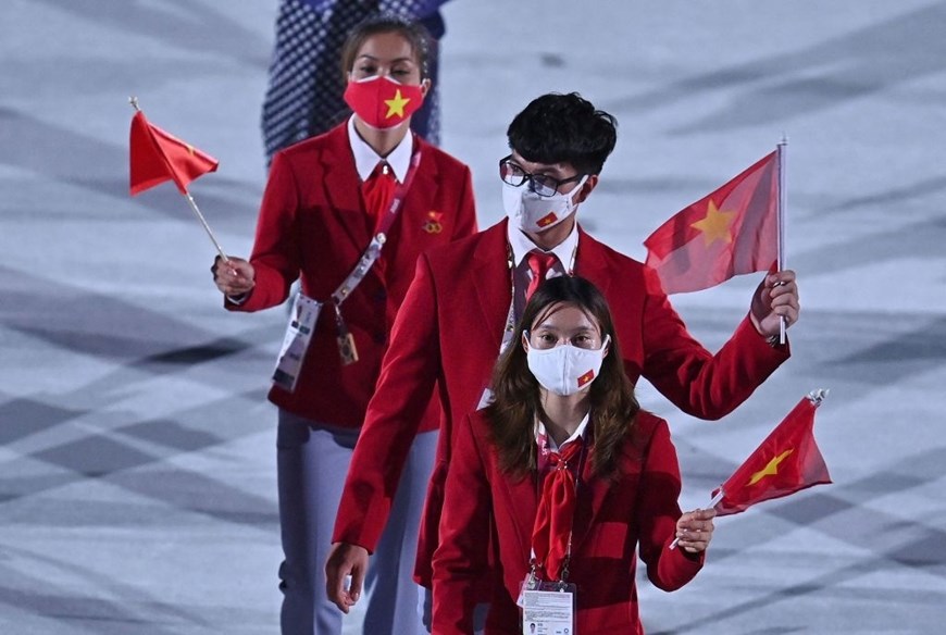Hình ảnh Đoàn thể thao Việt Nam diễu hành ở lễ khai mạc Olympic Tokyo
