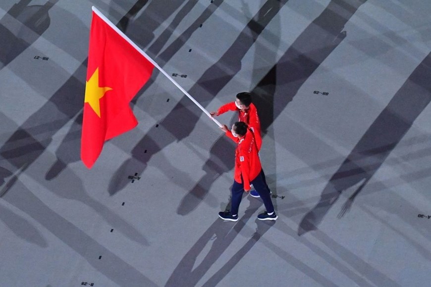 Hình ảnh Đoàn thể thao Việt Nam diễu hành ở lễ khai mạc Olympic Tokyo