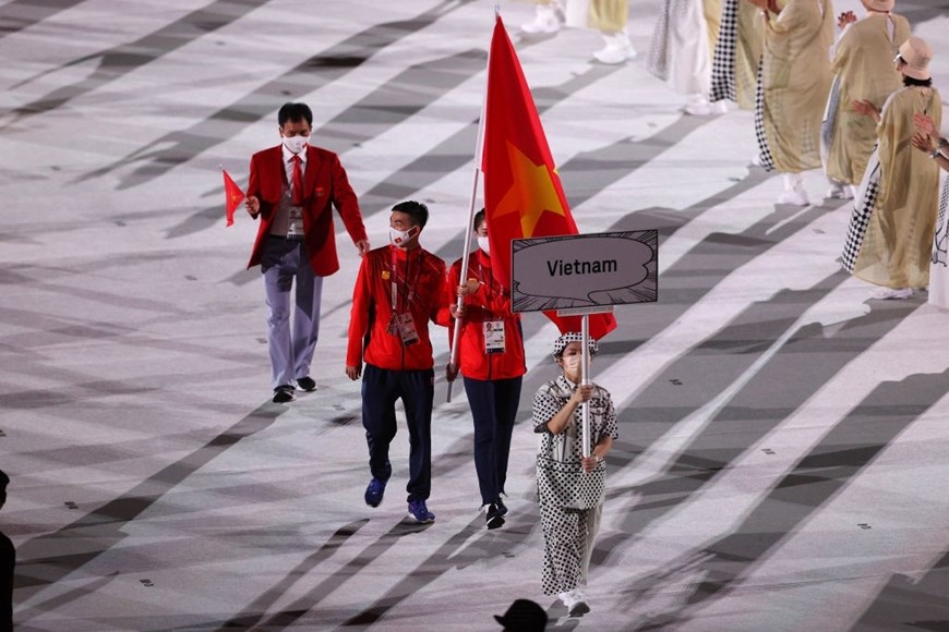 Hình ảnh Đoàn thể thao Việt Nam diễu hành ở lễ khai mạc Olympic Tokyo