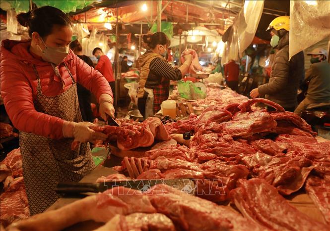 Thị trường thực phẩm hạ nhiệt sau thời gian dài xăng giảm giá