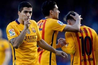Suarez ghi 4 bàn, Barca trút giận lên Deportivo